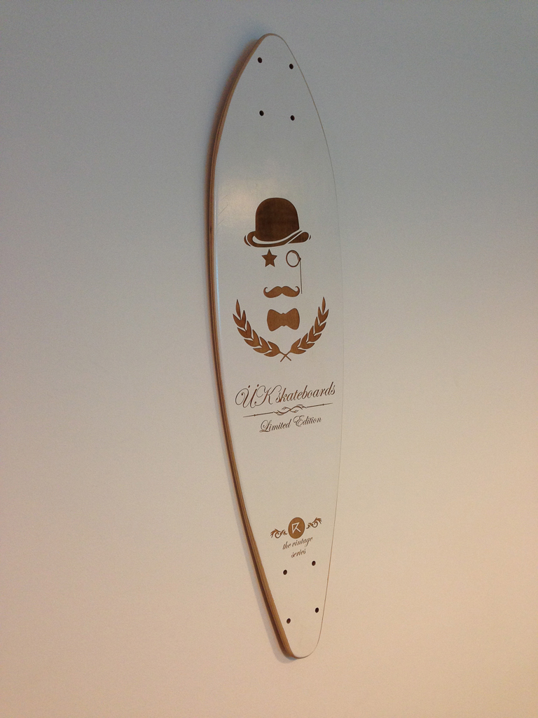 Custom design laser engraved skateboard decks by Uber Kreative.